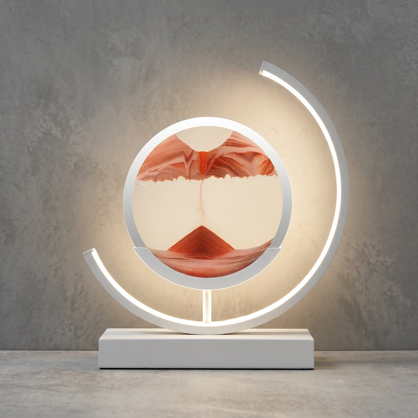 Aesthix Lume Drift quicksand art lamp orange sand white base product shot grey background