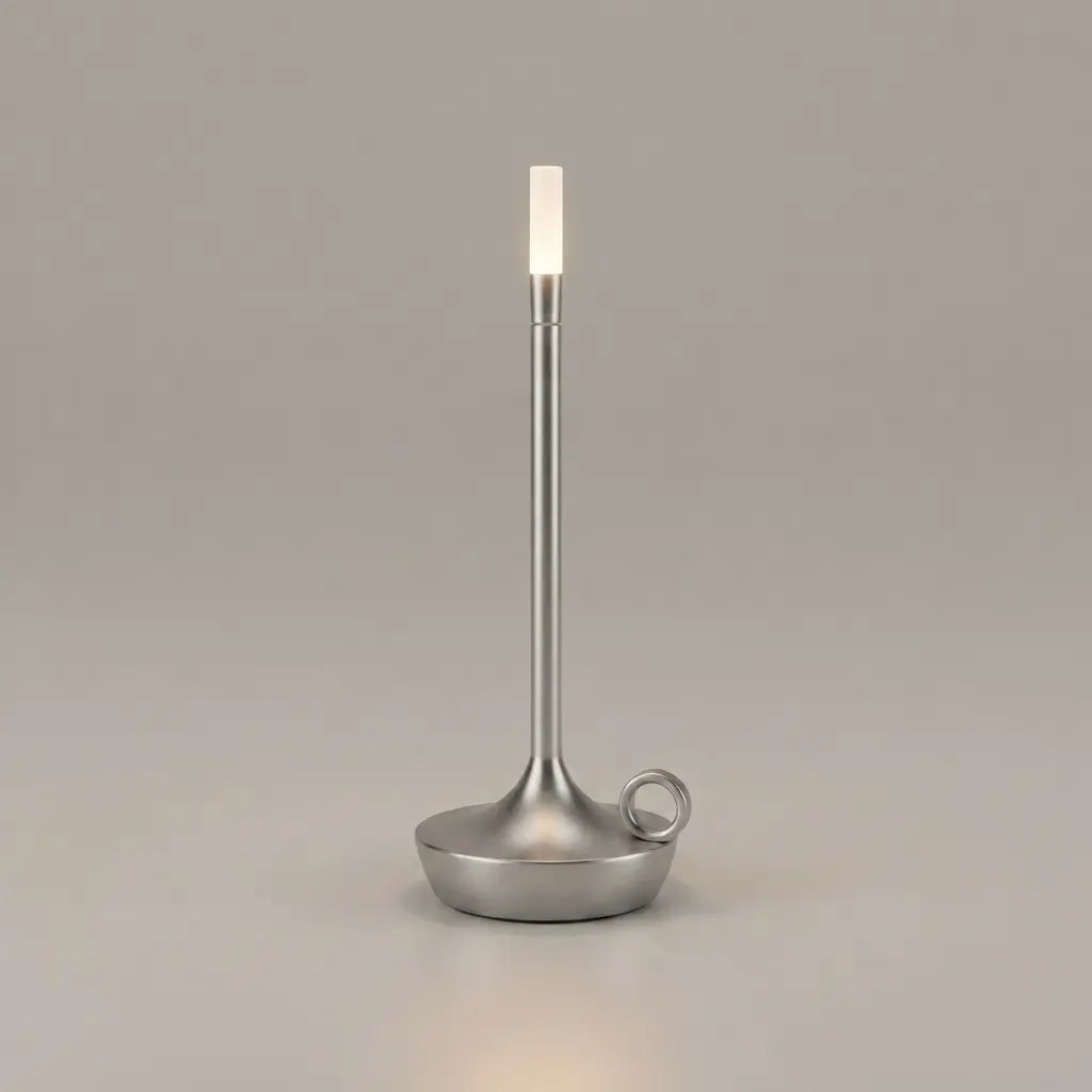 Aesthix Lume Taper candle glow lamp in brushed silver – modern flameless candle design