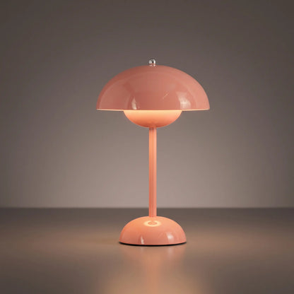 Aesthix Lume Bud retro table lamp in pink mushroom-dome finish on plain background