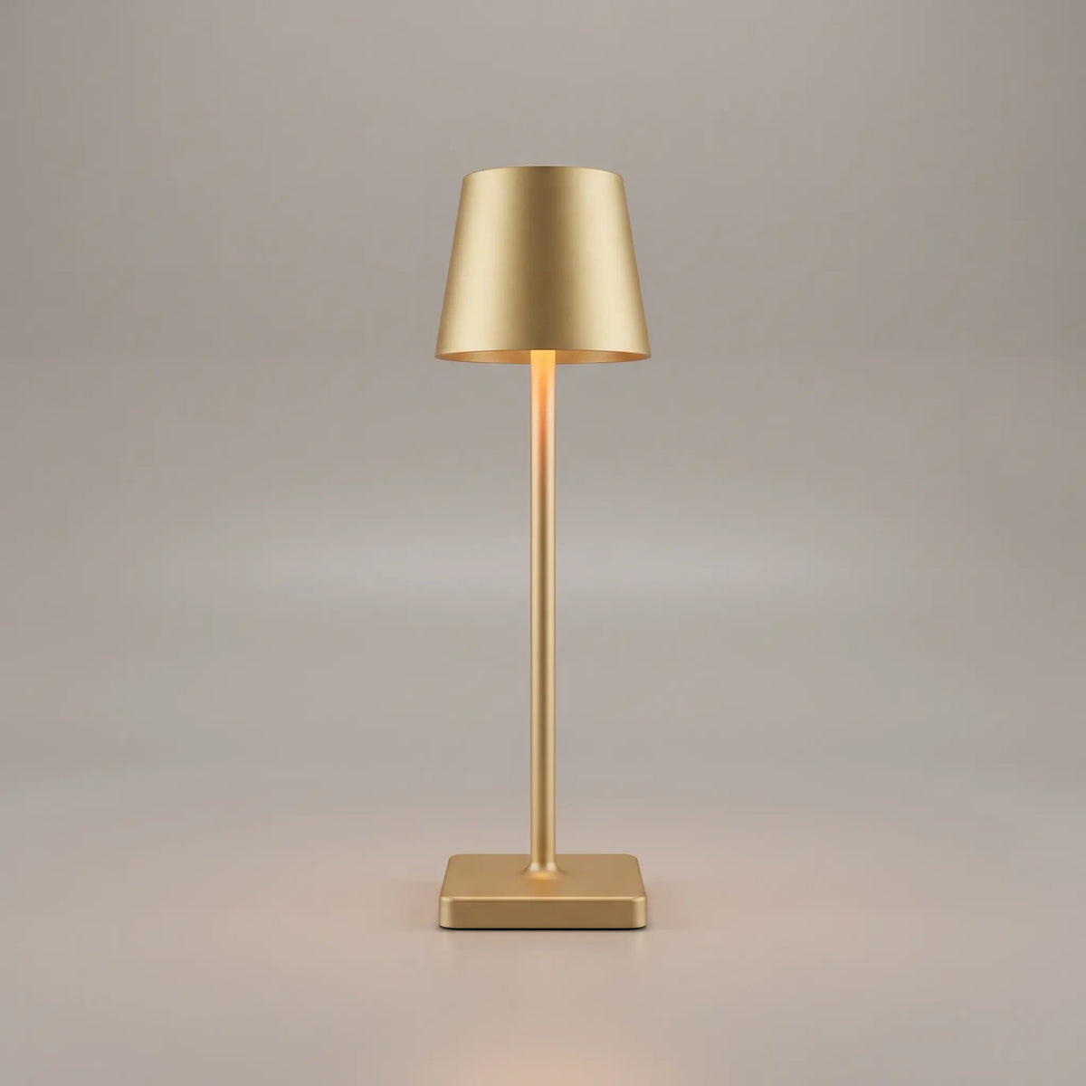 Aesthix Lume Classic bar style touch table lamp in gold finish on plain background