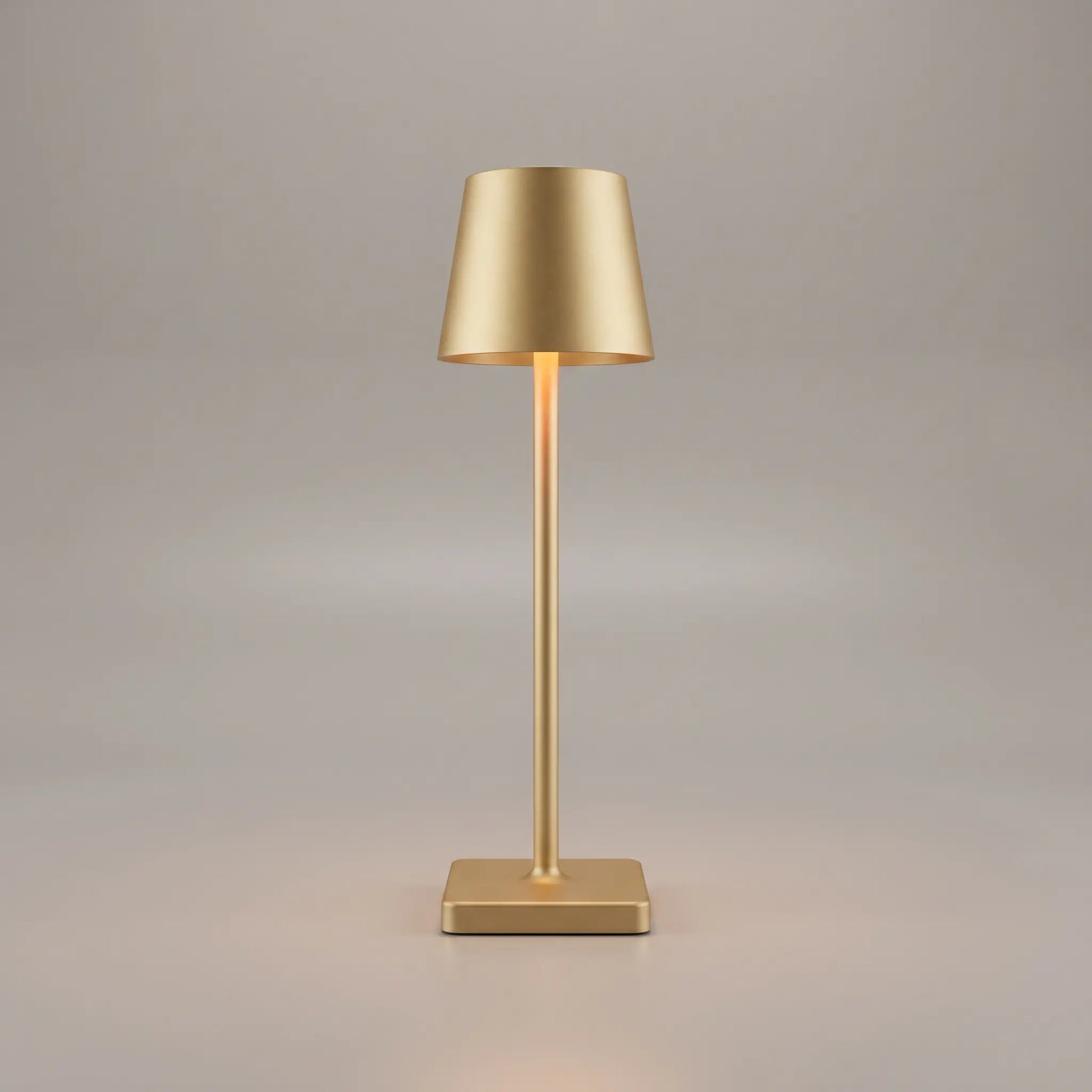 Aesthix Lume Classic bar style touch table lamp in gold finish on plain background