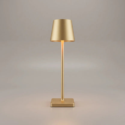 Aesthix Lume Classic bar style touch table lamp in gold finish on plain background