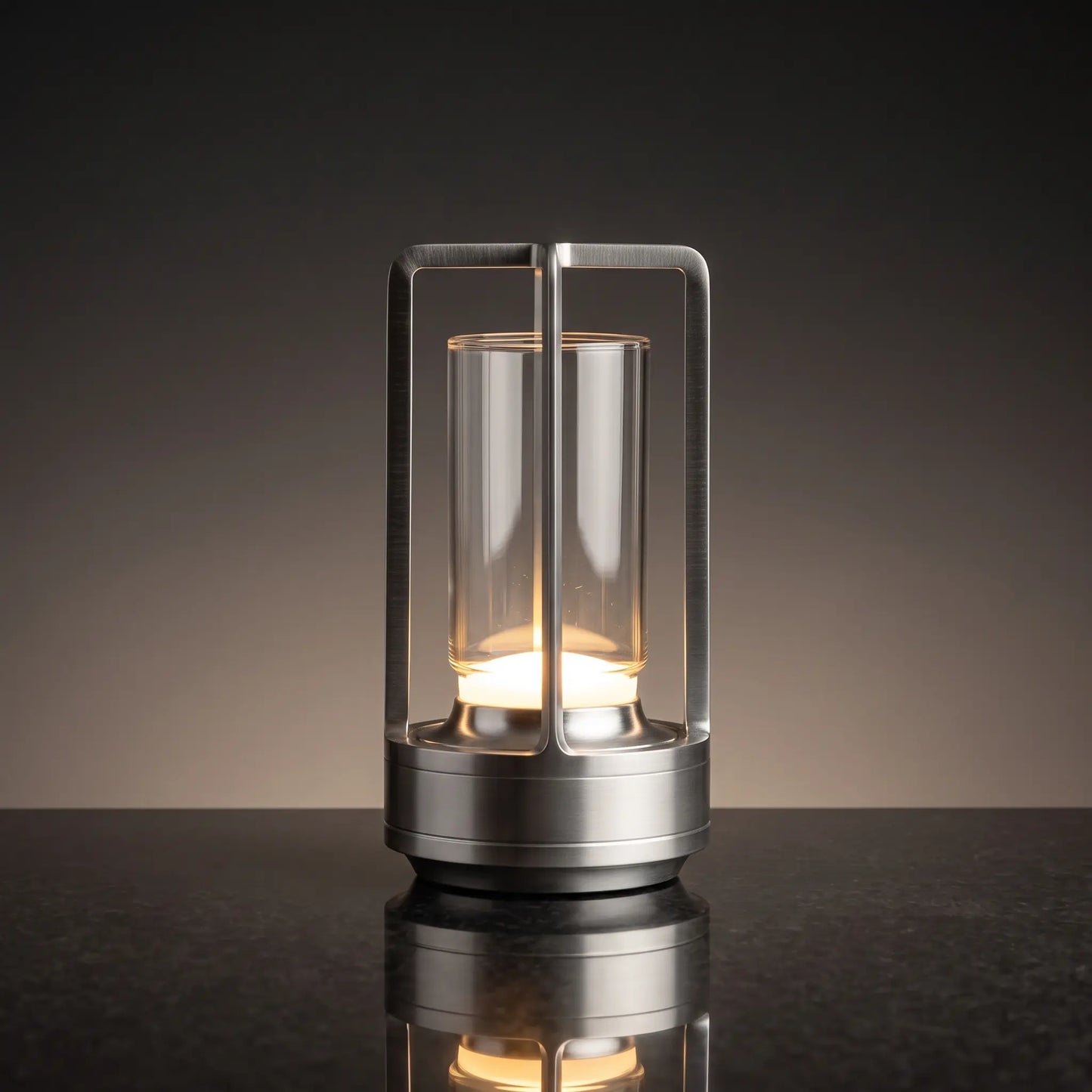 Aesthix Lume Luxe glass lantern table lamp in silver finish on a dark marble background