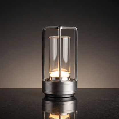Aesthix Lume Luxe glass lantern table lamp in silver finish on a dark marble background
