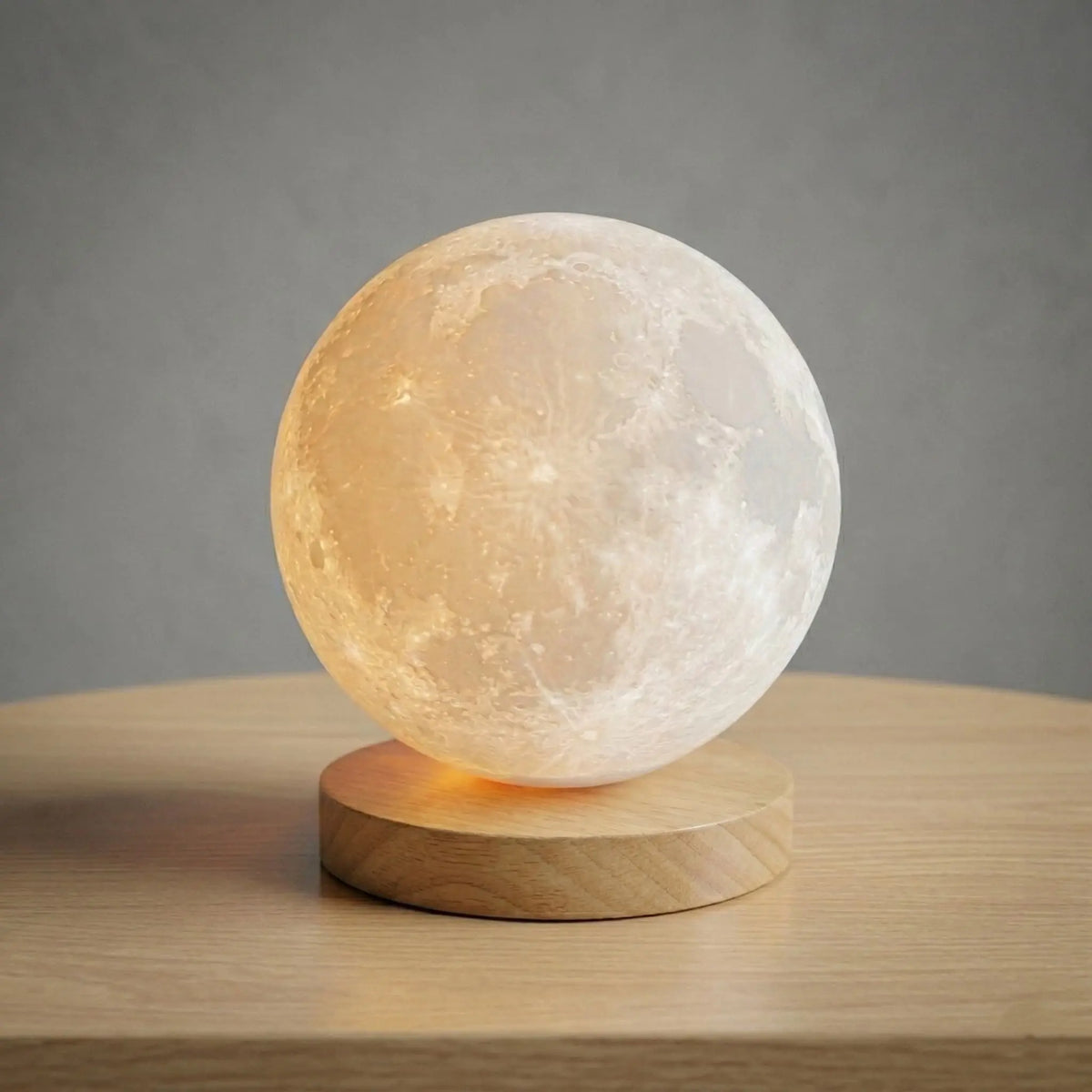 Aesthix Lume Luna moon lamp product shot wooden base clean background