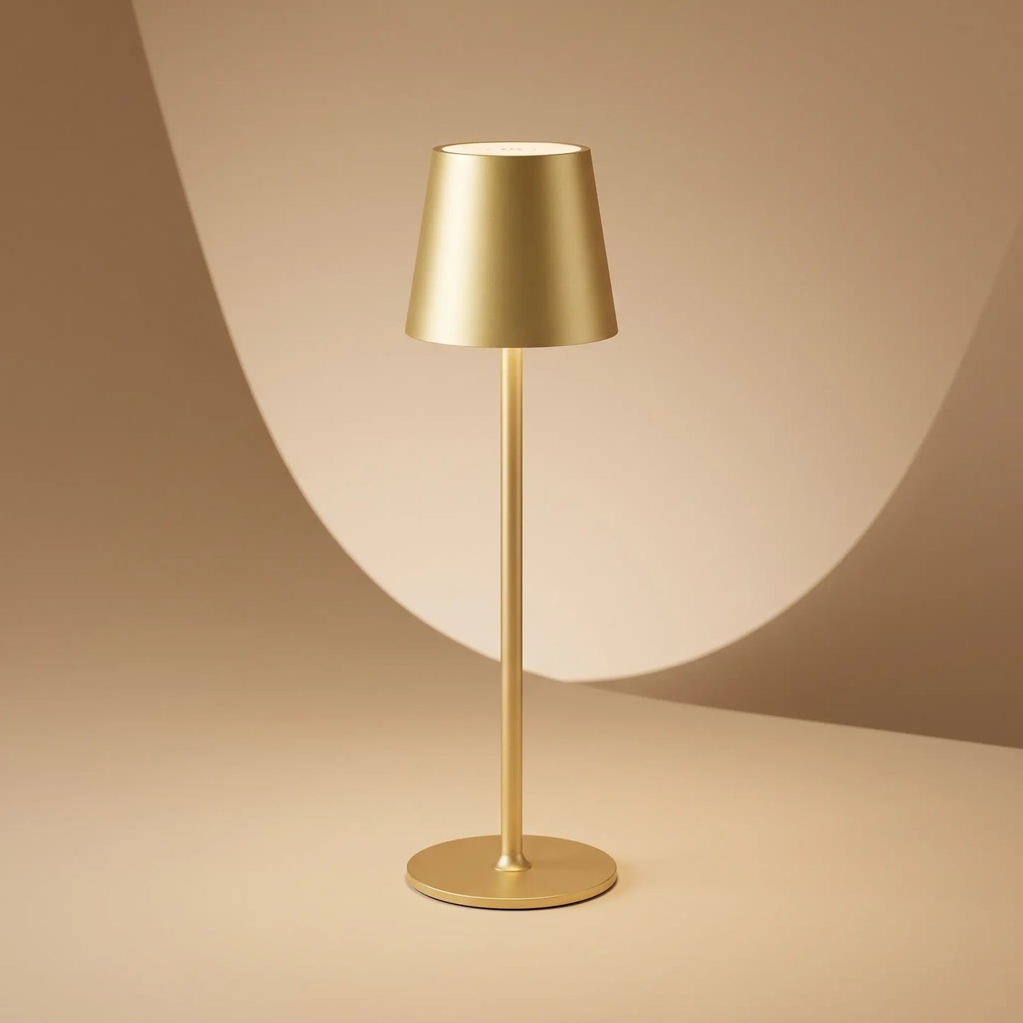 Aesthix Lume Poise rechargeable waterproof table lamp gold finish product shot luxury  studio background UK