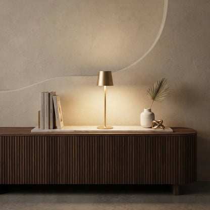 Aesthix Lume Poise rechargeable waterproof table lamp gold finish wooden sideboard books vase warm ambient light UK