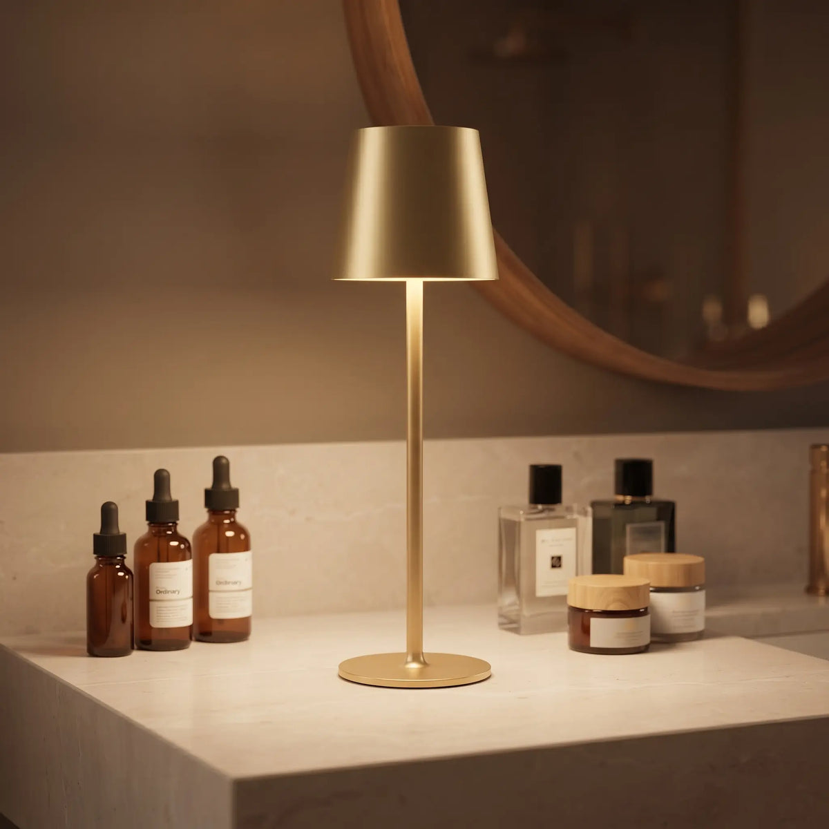 Aesthix Lume Poise rechargeable waterproof table lamp gold finish bathroom vanity mirror perfume bottles warm light UK