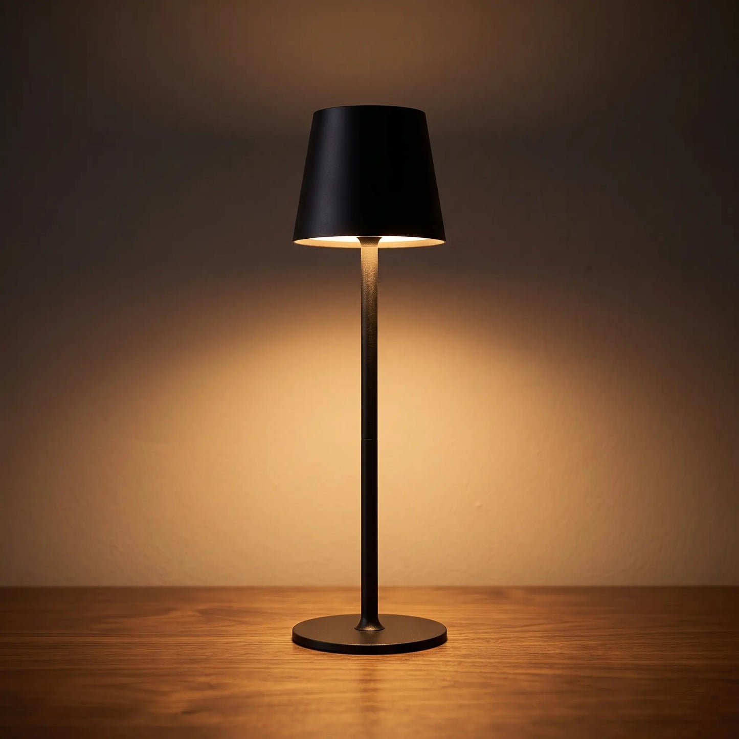 Aesthix Lume Poise rechargeable waterproof table lamp black finish dark background warm glow UK