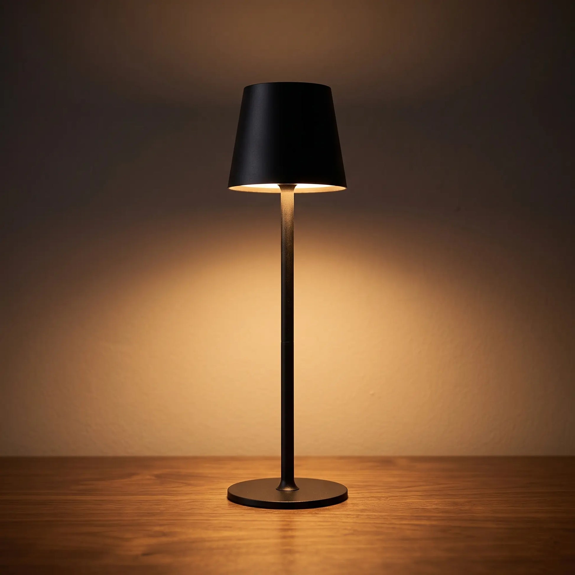 Aesthix Lume Poise rechargeable waterproof table lamp black finish dark background warm glow UK