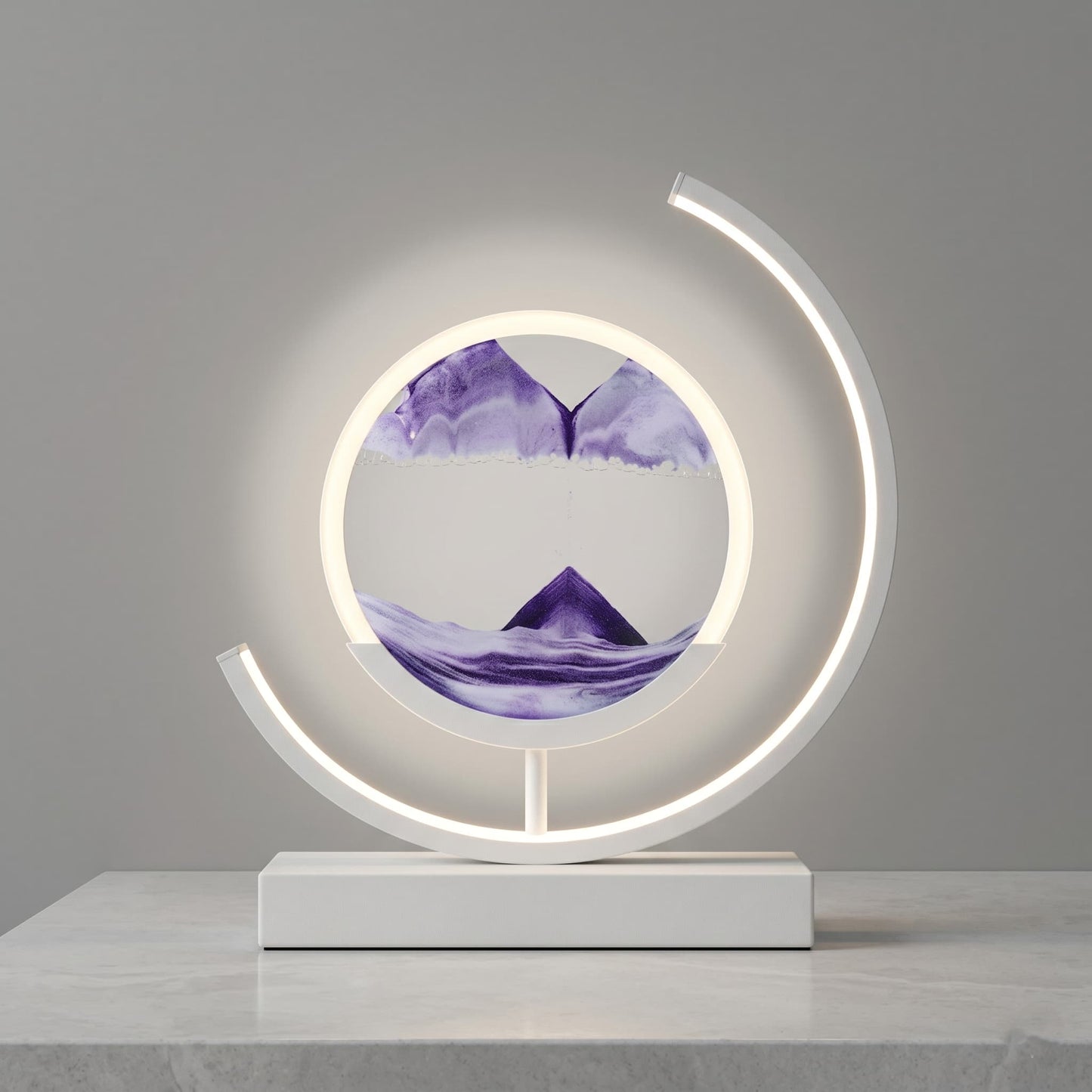 Aesthix Lume Drift quicksand art lamp purple sand product shot grey background warm glow