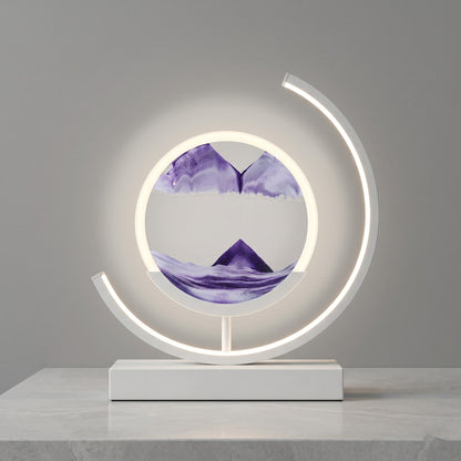 Aesthix Lume Drift quicksand art lamp purple sand product shot grey background warm glow