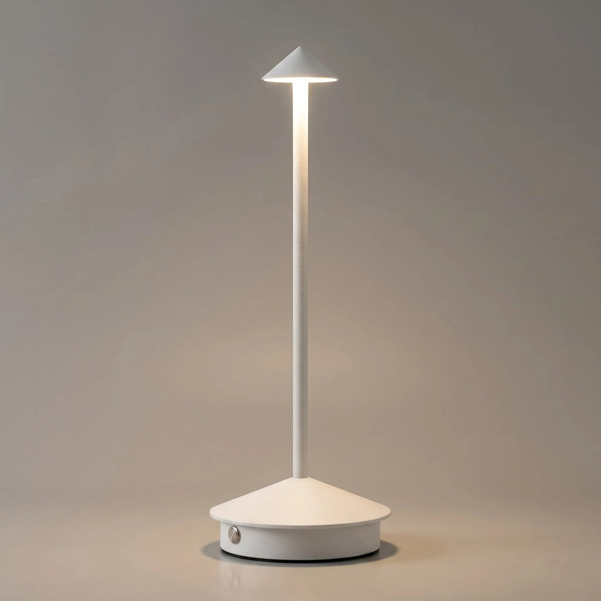 Aesthix Lume Vela slim rechargeable lamp in white finish on plain background