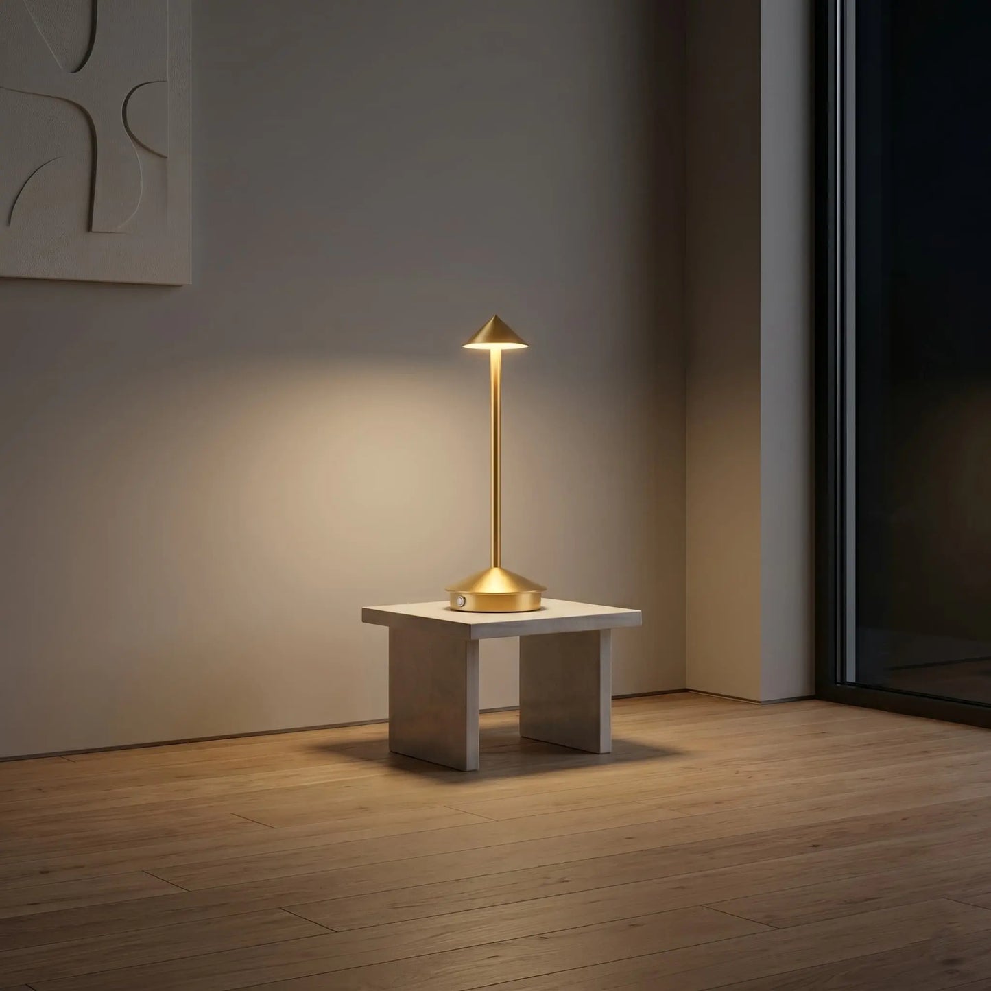 Aesthix Lume Vela slim rechargeable lamp on a small wooden stool in a dim room