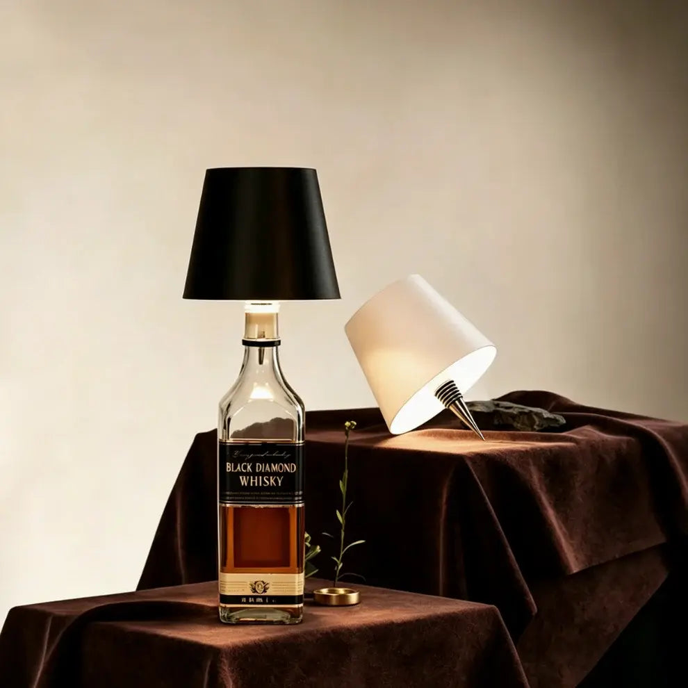 Aesthix Lume Vino Accent Bottle Lamp Bottle of Black Diamond Whisky with two lamps on a tablecloth-covered table.