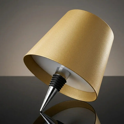 Aesthix Lume Vino accent bottle lamp gold finish product shot close-up angle UK